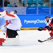 GANGNEUNG, SOUTH KOREA - FEBRUARY 24: Czech Republic's Martin Ruzicka #27 gets the puck past Canada's Kevin Poulin #31 to score a first period goal during bronze medal round action at the PyeongChang 2018 Olympic Winter Games. (Photo by Matt Zambonin/HHOF-IIHF Images)

